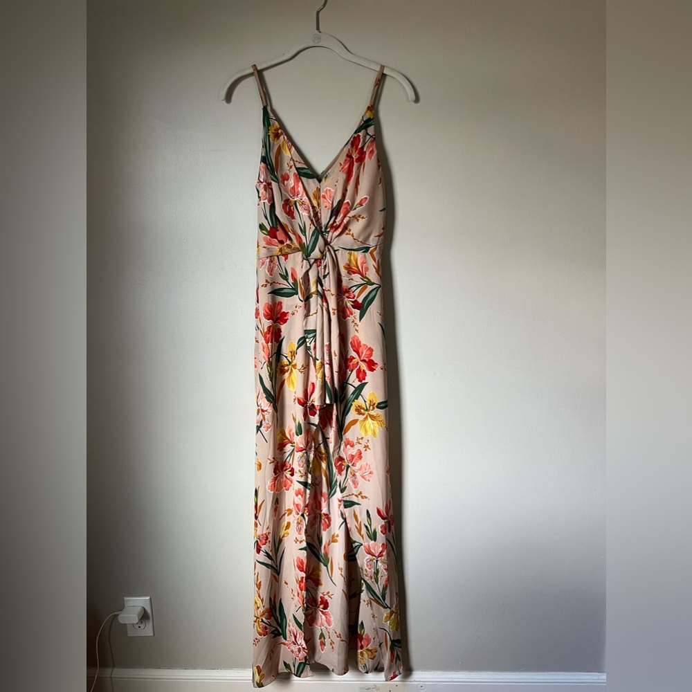 High Low Romper in beautiful floral pattern. Size small